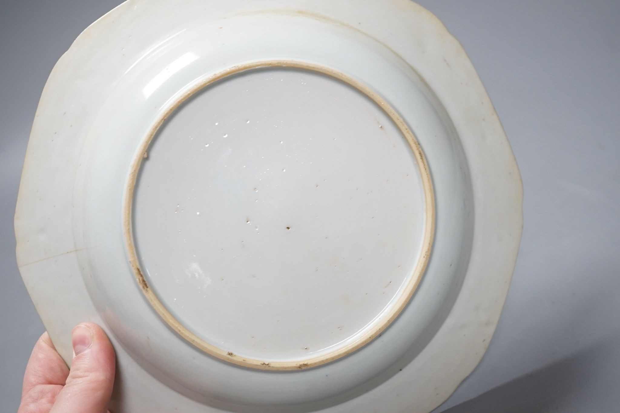 A Set of six 18th century Chinese export blue and white ‘bird in a cage’ small plates, 6.3 cm diameter and two pairs of 18th century Chinese export blue and white plates dishes, largest 23cm diam (10)